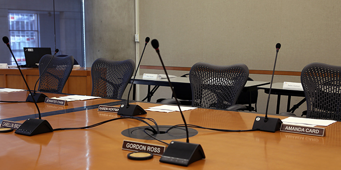 Empty table set up for a board meeting