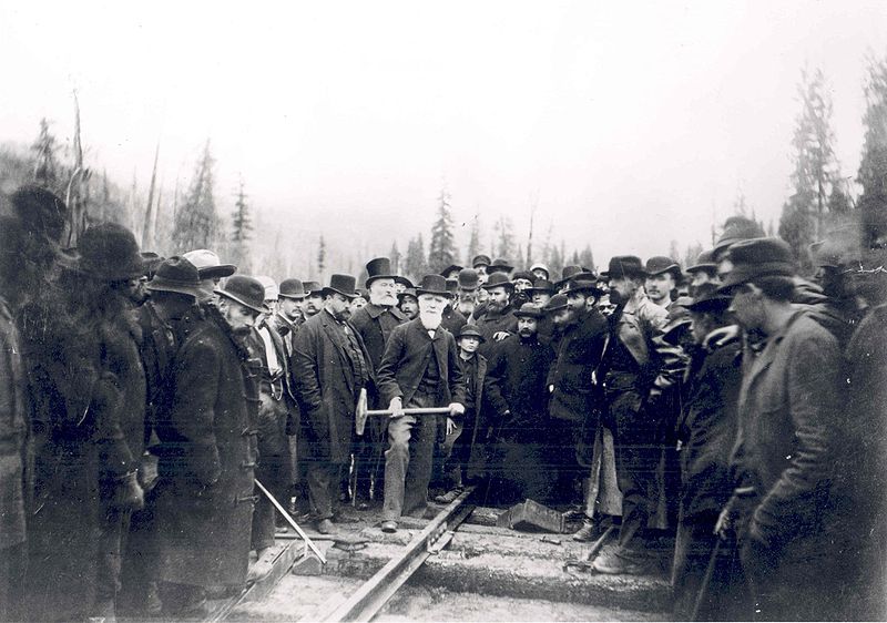 Donald Alexander Smith driving the last spike of the Canadian Pacific Railway. 