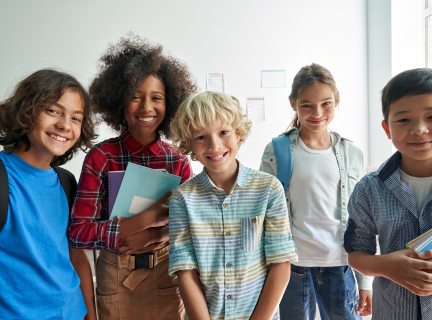 Kids standing and smiling