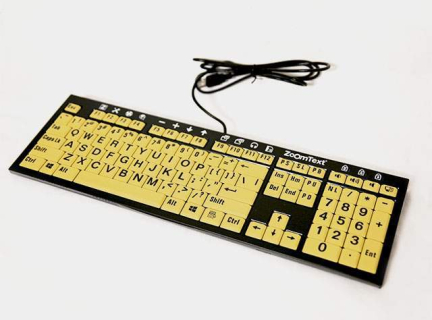 A black-on-yellow large print keyboard for people who prefer enhanced contrast.