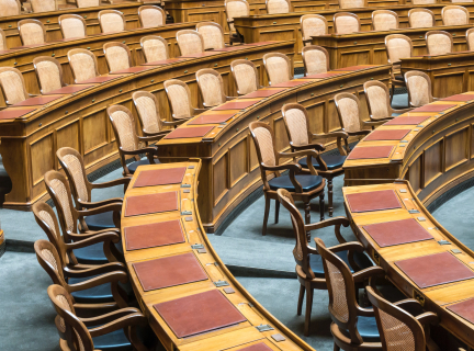 brown wooden chairs on blue and brown wooden floor