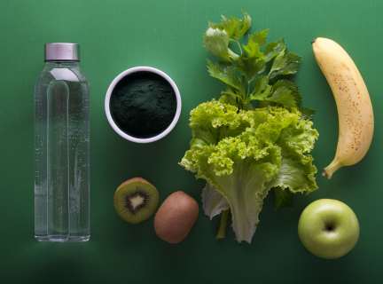 assorted fruits and vegetables on green surface