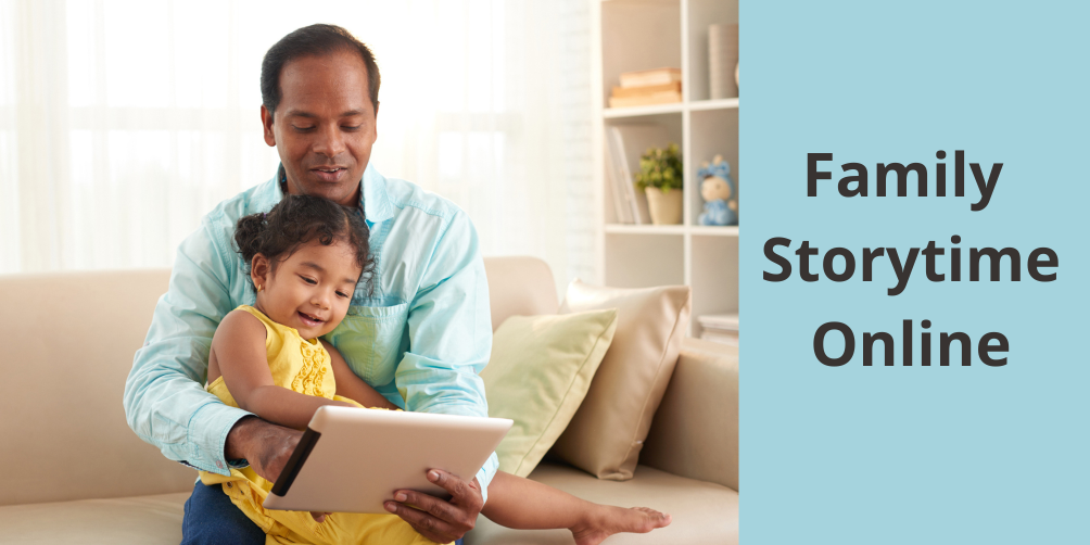 Caregiver and child watching an iPad