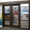 Main Entrance to Special Collections with Library and Archives standing banner